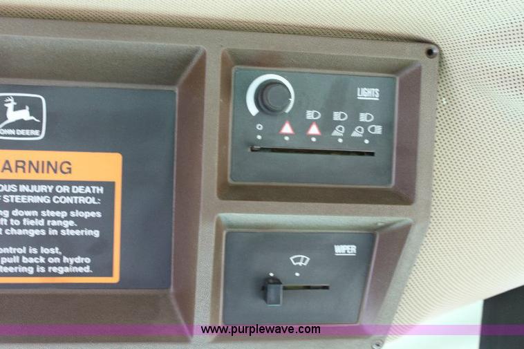 image for item 6869 2001 John Deere 4990 self propelled swather