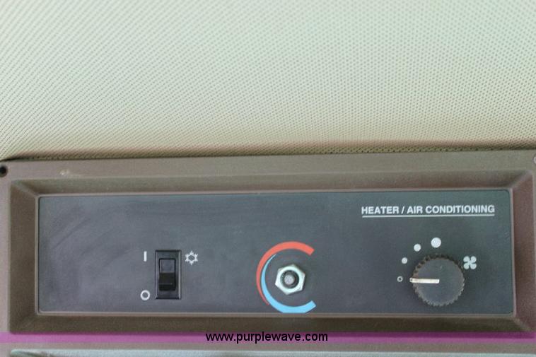 image for item 6869 2001 John Deere 4990 self propelled swather