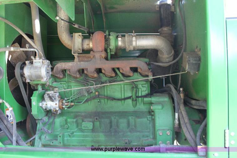 image for item 6869 2001 John Deere 4990 self propelled swather