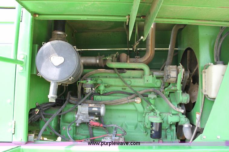 image for item 6869 2001 John Deere 4990 self propelled swather