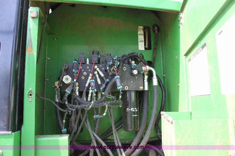 image for item 6869 2001 John Deere 4990 self propelled swather