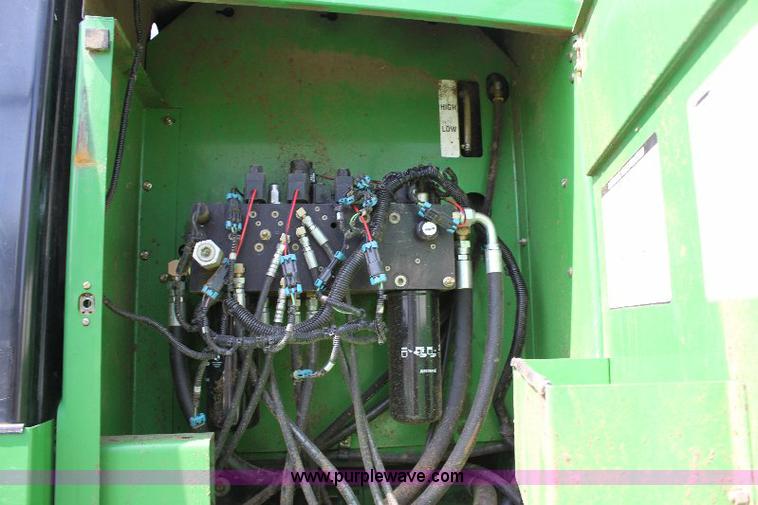 image for item 6869 2001 John Deere 4990 self propelled swather