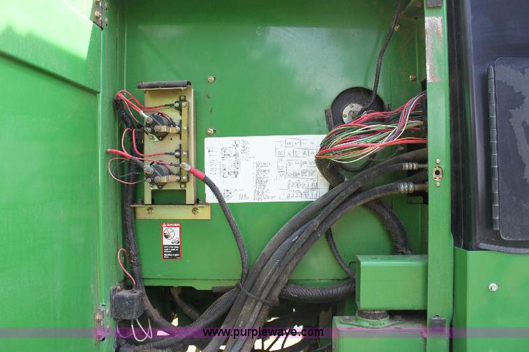 image for item 6869 2001 John Deere 4990 self propelled swather