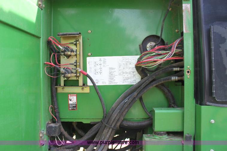 image for item 6869 2001 John Deere 4990 self propelled swather