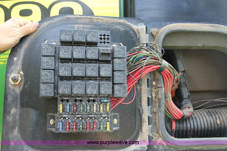 image for item 6869 2001 John Deere 4990 self propelled swather