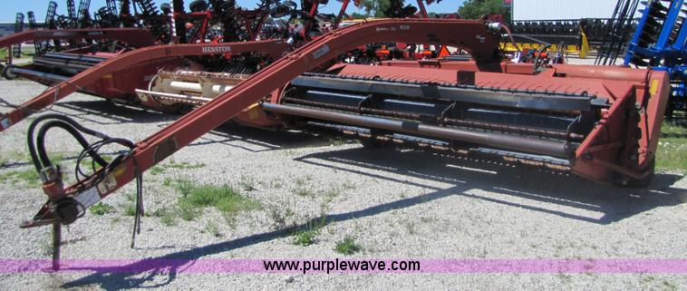 image for item 8482 Case 8370 14' hydra-swing swather