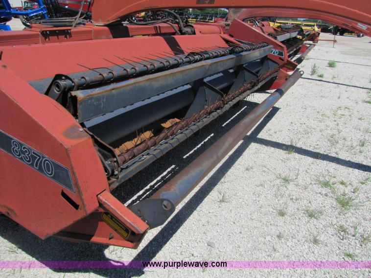 image for item 8482 Case 8370 14' hydra-swing swather