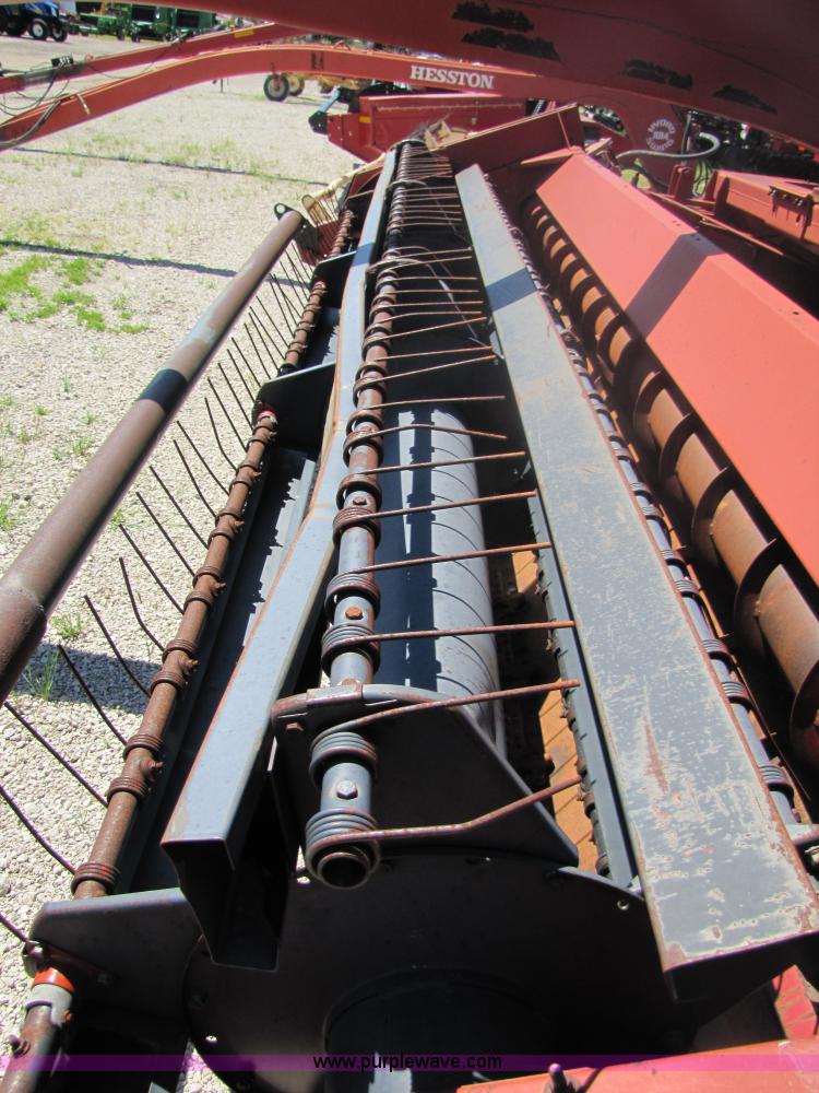 image for item 8482 Case 8370 14' hydra-swing swather