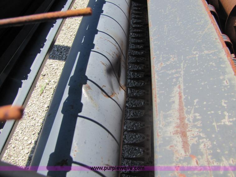 image for item 8482 Case 8370 14' hydra-swing swather