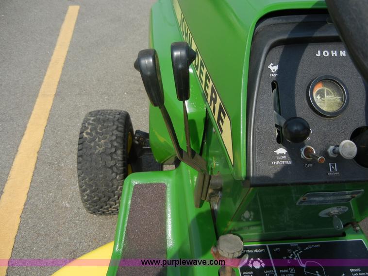 image for item 2365 John Deere 317 lawn mower with rear tiller
