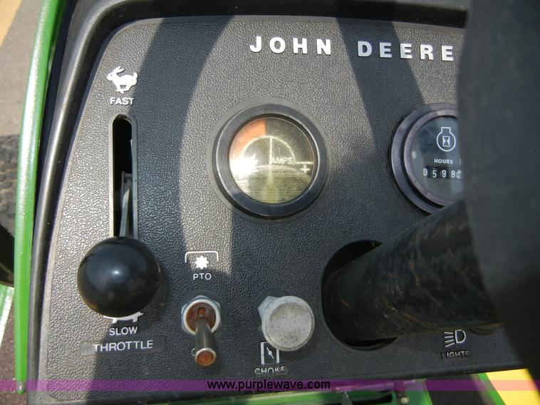 image for item 2365 John Deere 317 lawn mower with rear tiller