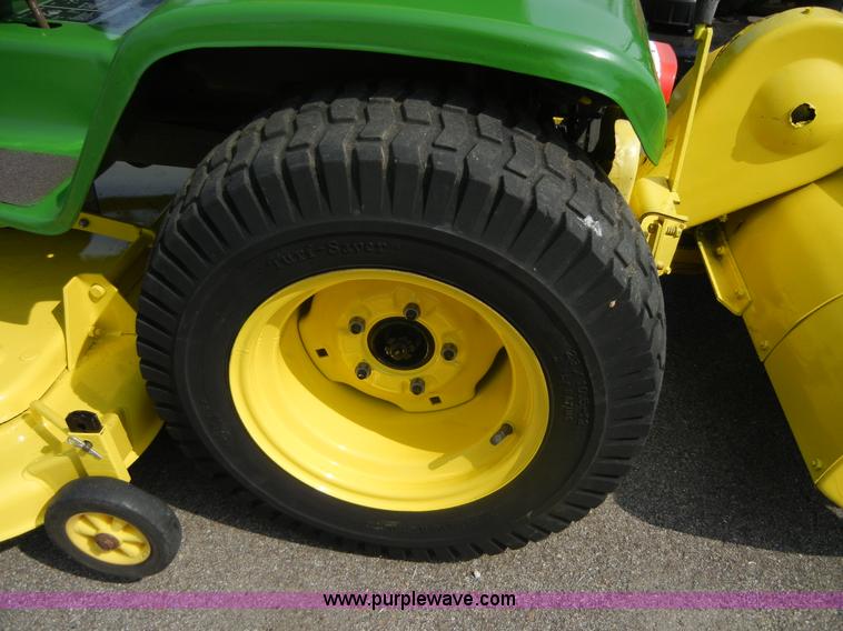 image for item 2365 John Deere 317 lawn mower with rear tiller