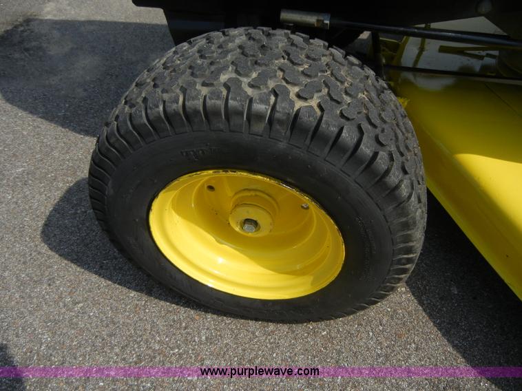 image for item 2365 John Deere 317 lawn mower with rear tiller