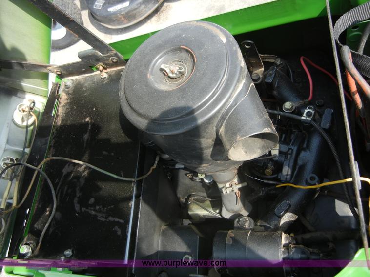 image for item 2365 John Deere 317 lawn mower with rear tiller