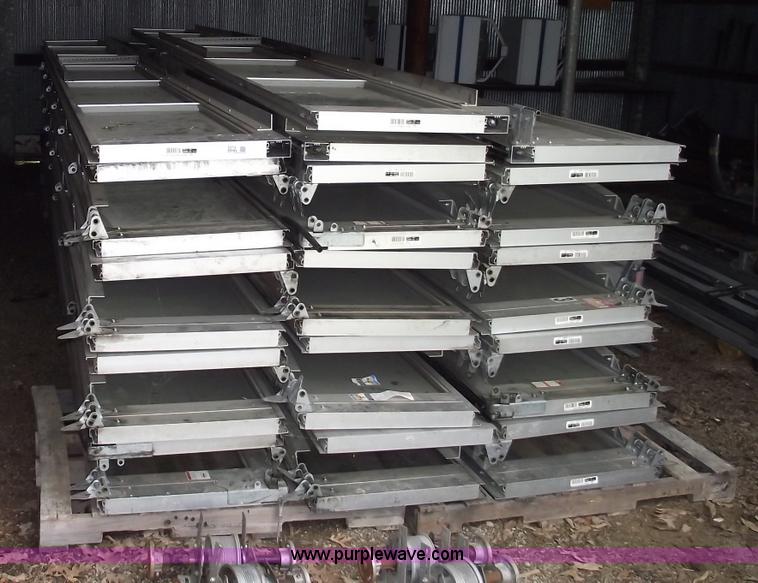 image for item 5570 (4) 14 x 22 aluminum commercial garage doors