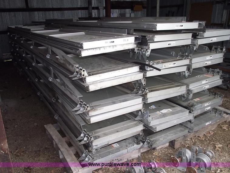 image for item 5570 (4) 14 x 22 aluminum commercial garage doors
