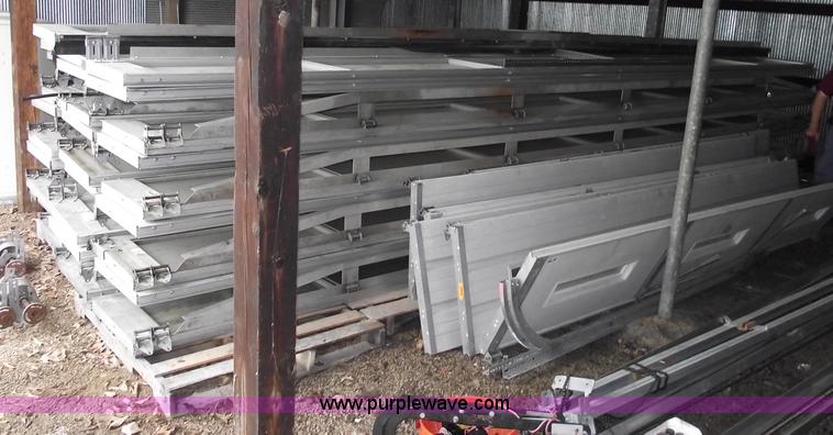 image for item 5570 (4) 14 x 22 aluminum commercial garage doors