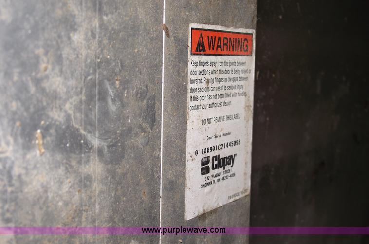 image for item 5570 (4) 14 x 22 aluminum commercial garage doors