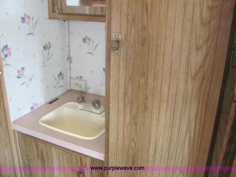 image for item 6972 1989 Fleetwood Terry Resort 24' pull camper