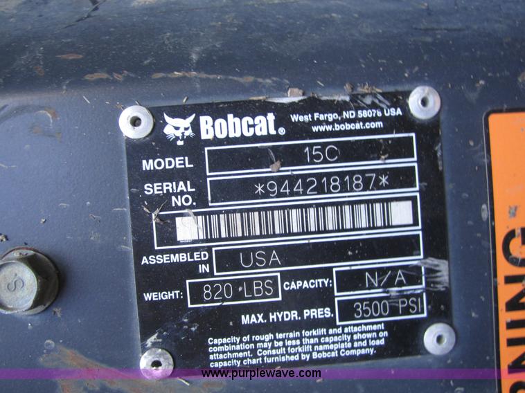 image for item A4800 Bobcat 15C auger mounting bracket with bit