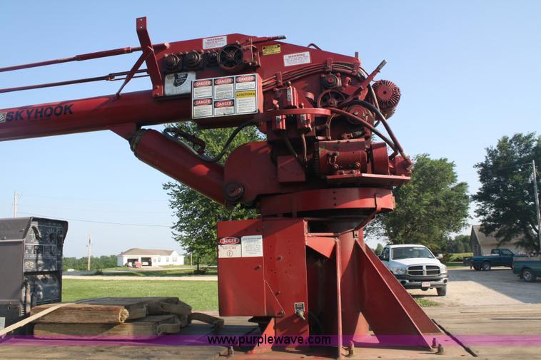 image for item 5085 1987 GMC 7000 flatbed truck with crane attachment