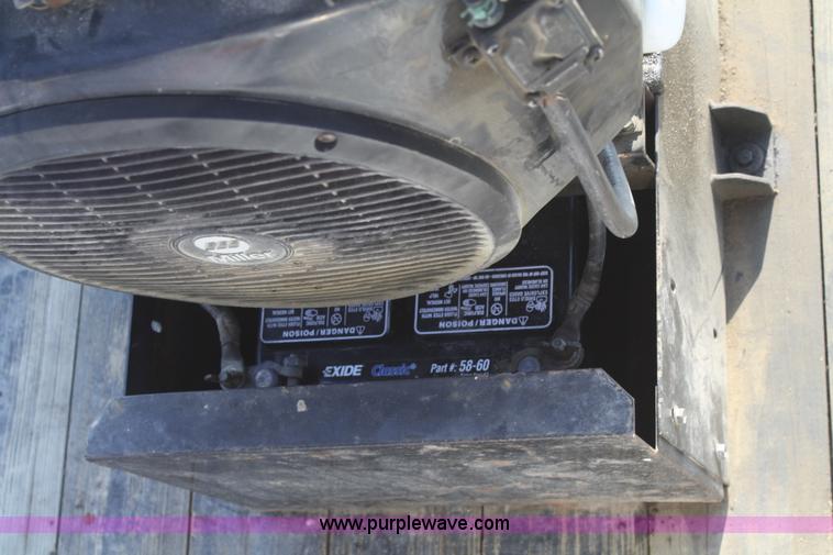 image for item 5085 1987 GMC 7000 flatbed truck with crane attachment