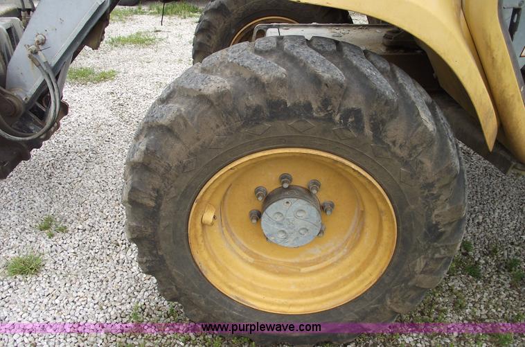 image for item 5560 1999 New Holland LM640 telehandler