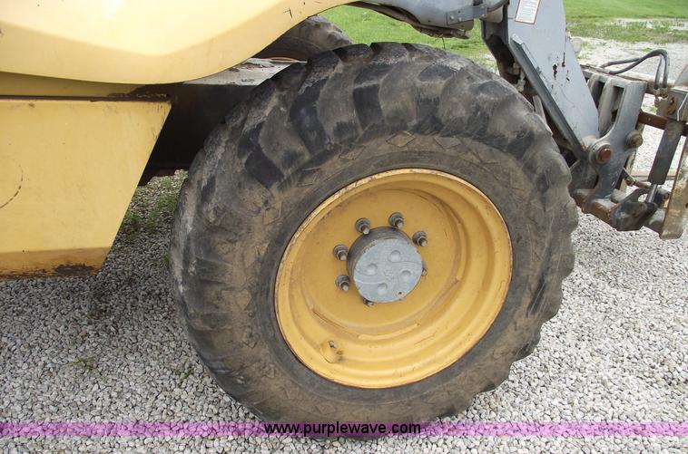 image for item 5560 1999 New Holland LM640 telehandler