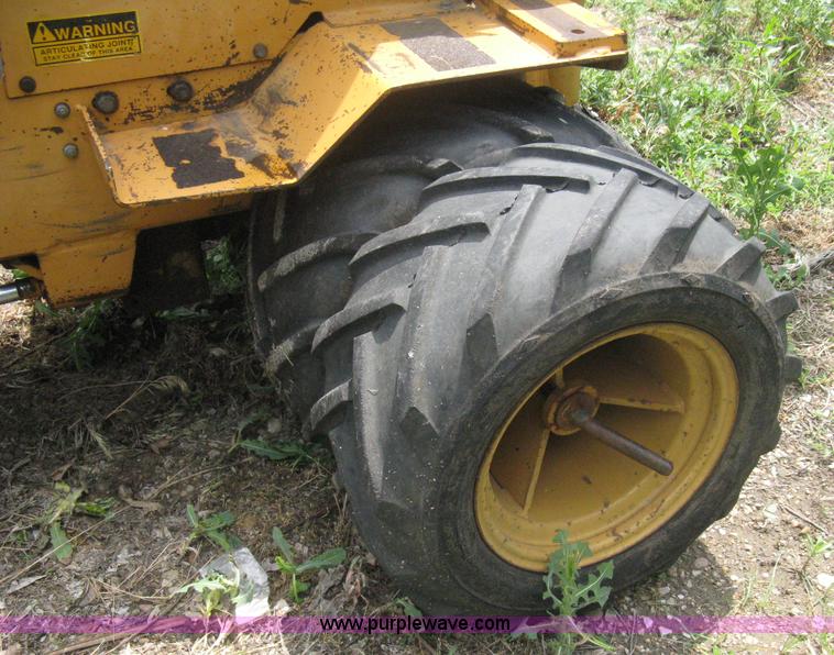 image for item 8001 1992 Case Maxi-Sneaker series B articulated trencher and vibratory plow tractor