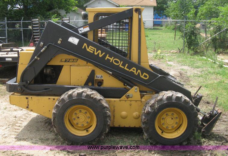 image for item 8002 New Holland L785 skid steer