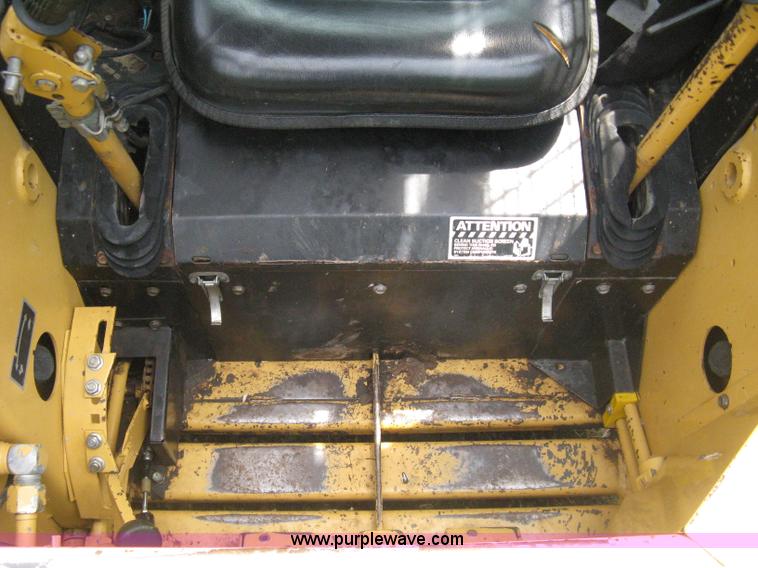 image for item 8002 New Holland L785 skid steer