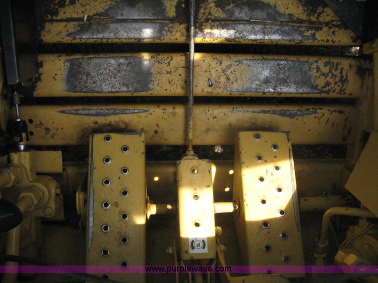 image for item 8002 New Holland L785 skid steer