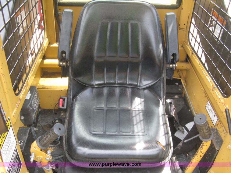 image for item 8002 New Holland L785 skid steer