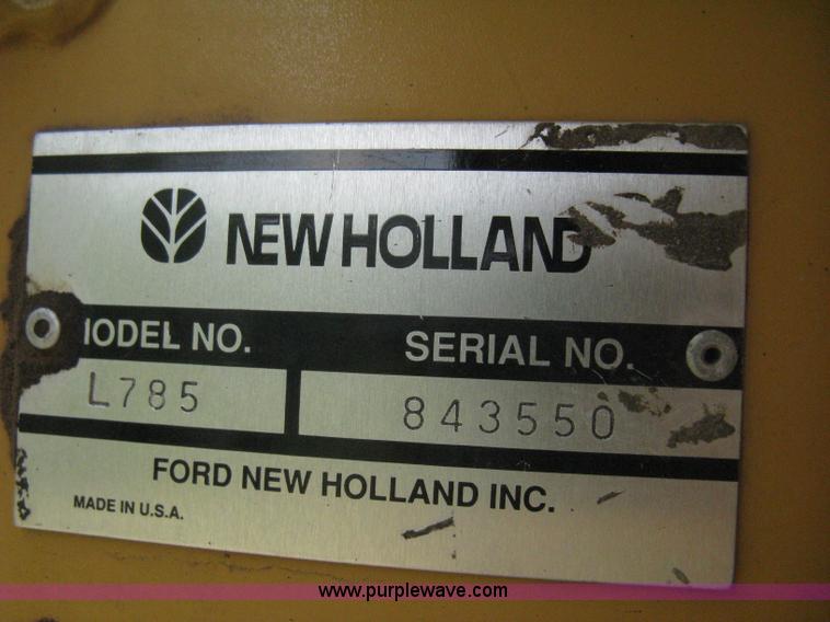 image for item 8002 New Holland L785 skid steer