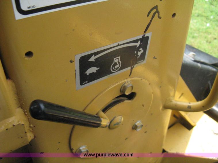 image for item 8002 New Holland L785 skid steer