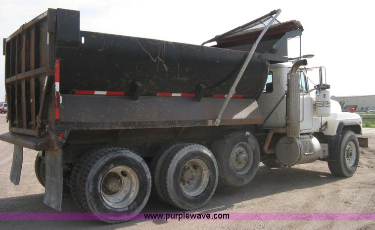 image for item 8115 1997 Mack RD690S triple axle dump truck