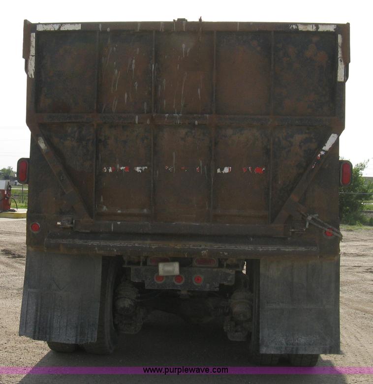 image for item 8115 1997 Mack RD690S triple axle dump truck