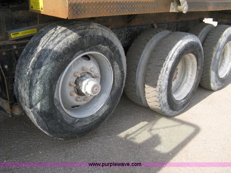 image for item 8115 1997 Mack RD690S triple axle dump truck