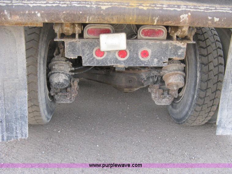 image for item 8115 1997 Mack RD690S triple axle dump truck