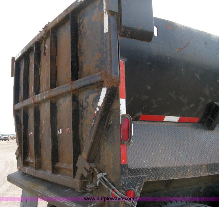 image for item 8115 1997 Mack RD690S triple axle dump truck
