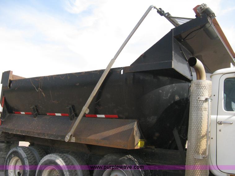 image for item 8115 1997 Mack RD690S triple axle dump truck