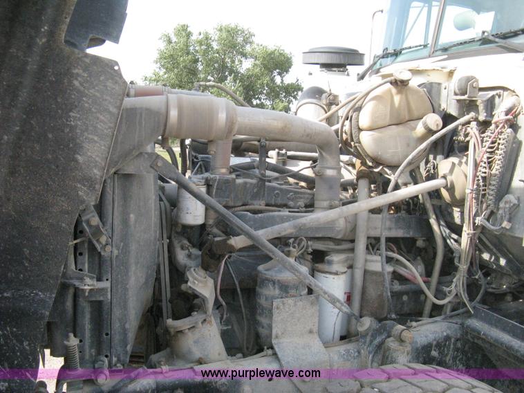 image for item 8115 1997 Mack RD690S triple axle dump truck