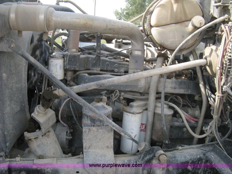 image for item 8115 1997 Mack RD690S triple axle dump truck