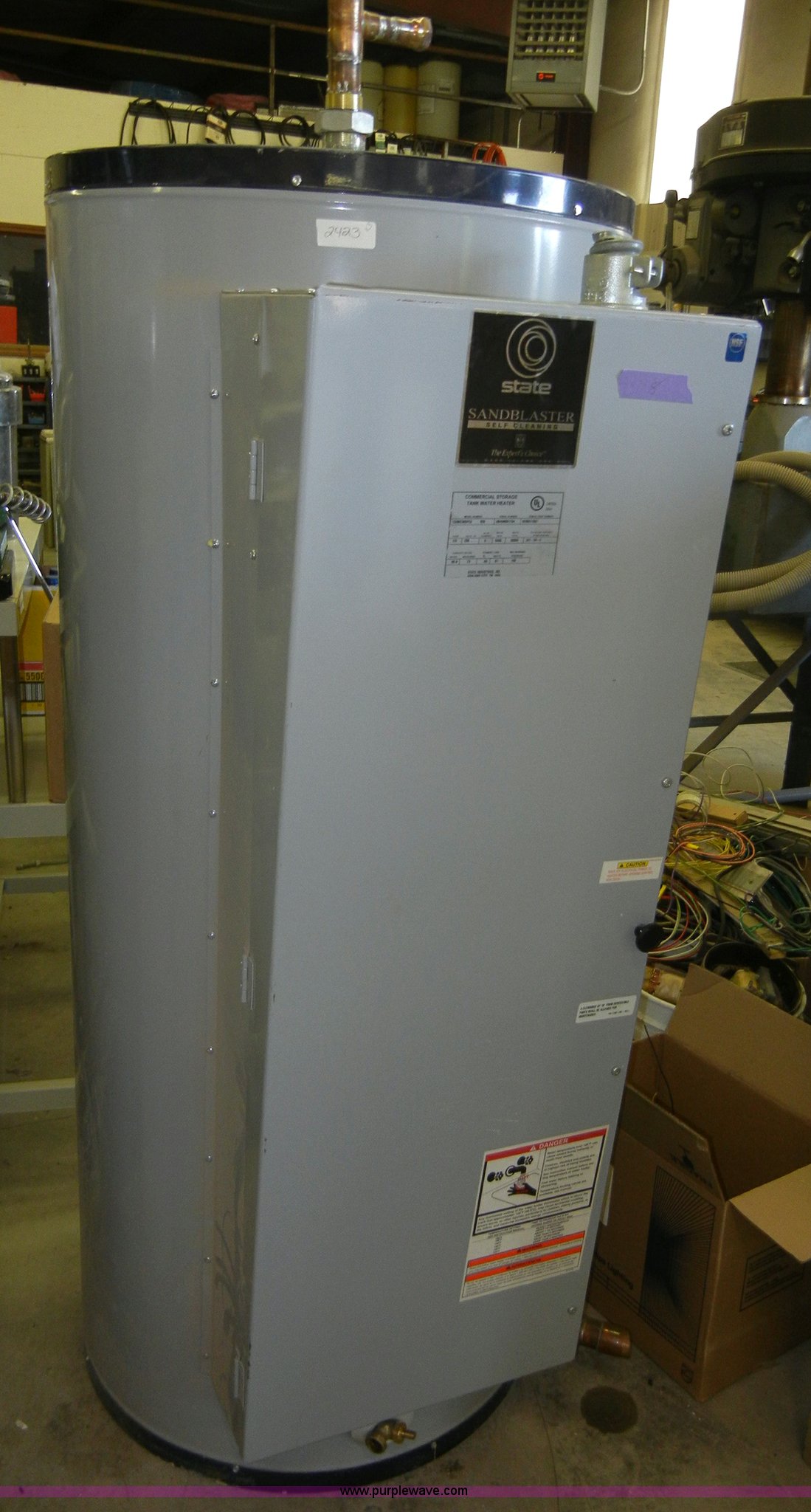 Hot water heaters and sink in Wamego, KS | Item 2423 sold | Purple Wave