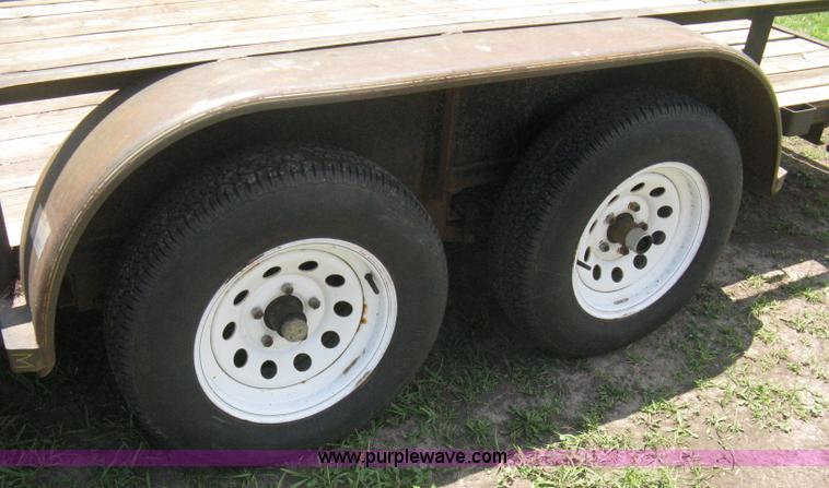 image for item A4257 1993 Diamond C 16' tandem axle flatbed trailer