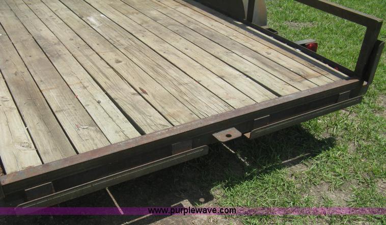 image for item A4257 1993 Diamond C 16' tandem axle flatbed trailer