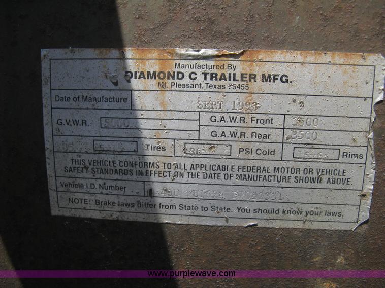 image for item A4257 1993 Diamond C 16' tandem axle flatbed trailer