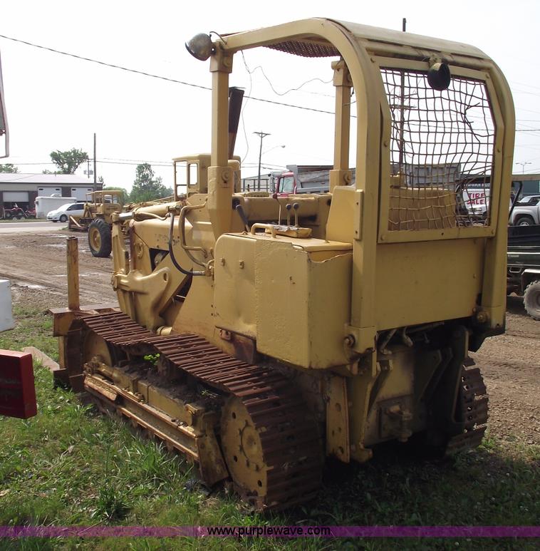 image for item 5431 Dresser 100C track loader with forks