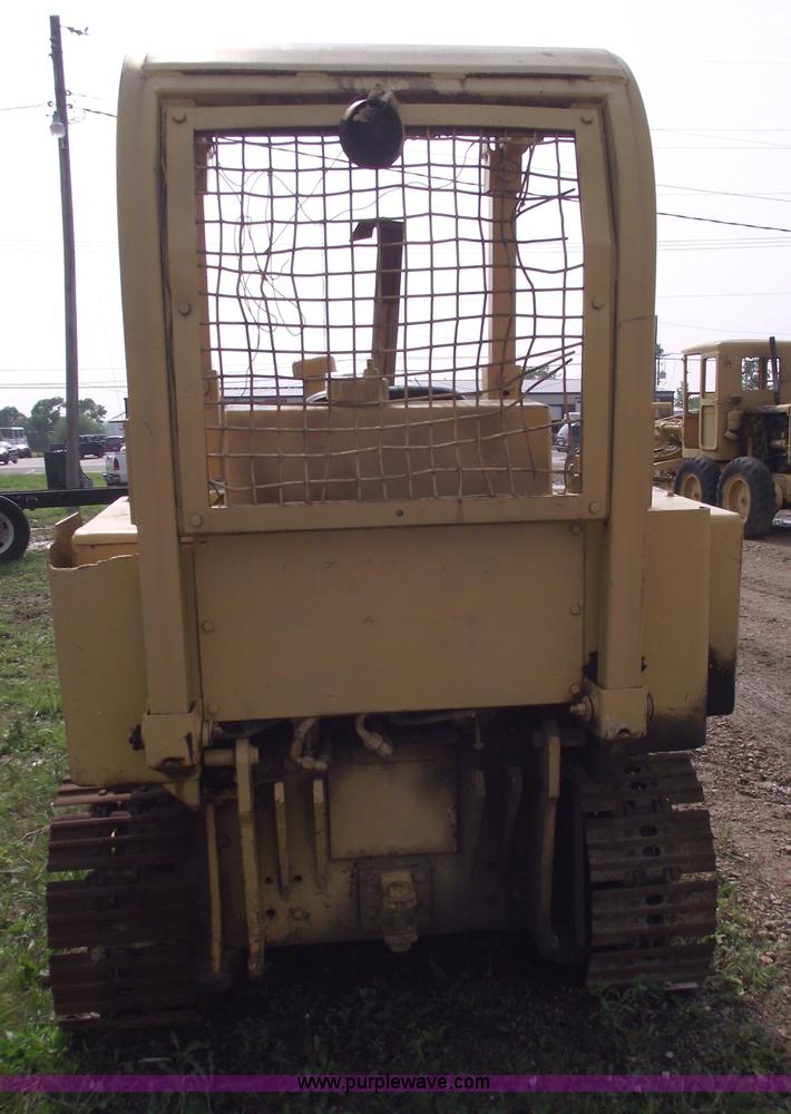 image for item 5431 Dresser 100C track loader with forks