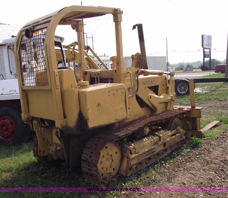 image for item 5431 Dresser 100C track loader with forks